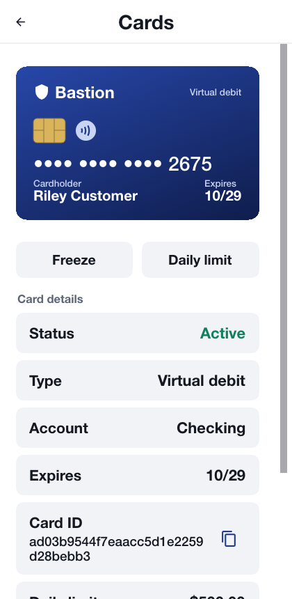 The cards screen with a card, its masked number, its daily limit and buttons to freeze it and change the limit