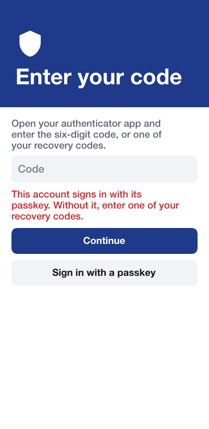 The code step refusing an authenticator code because the account has a passkey, with a button to sign in with the passkey